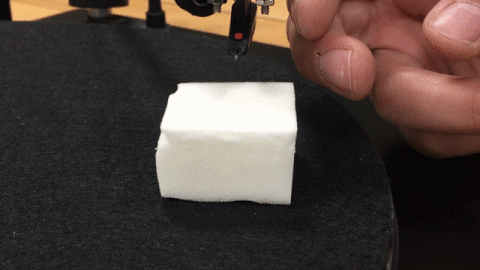 Gif showing how to use a Magic Eraser as a stylus cleaner