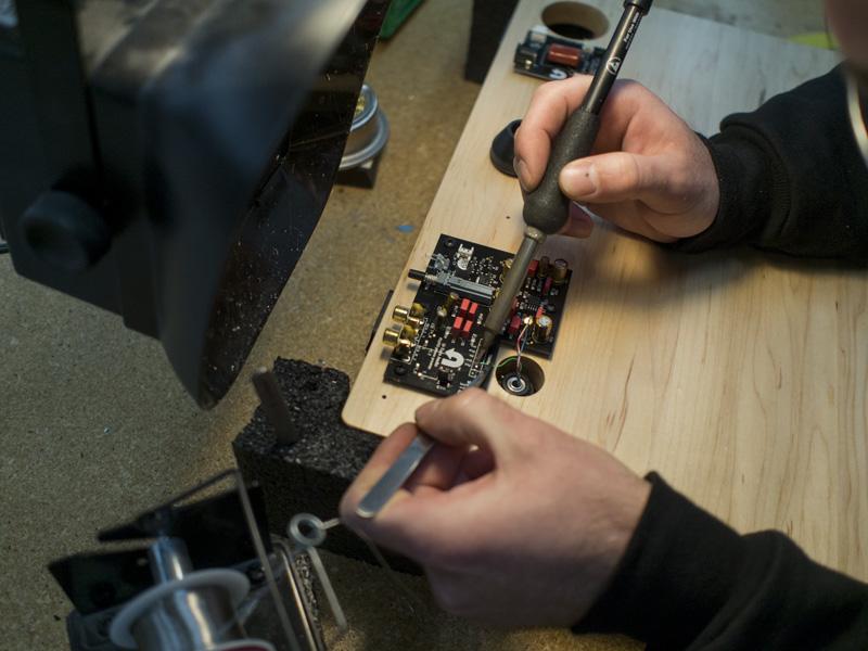 Tonearm being installed on a Maple Orbit plinth