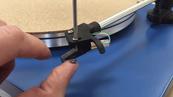 Gif of new cartridge screws and nuts being installed