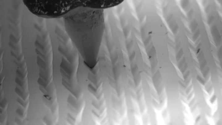 Gif showing how a stylus tracks in the grooves of a vinyl record