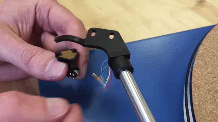 Gif of tonearm wires being installed on new cartridge